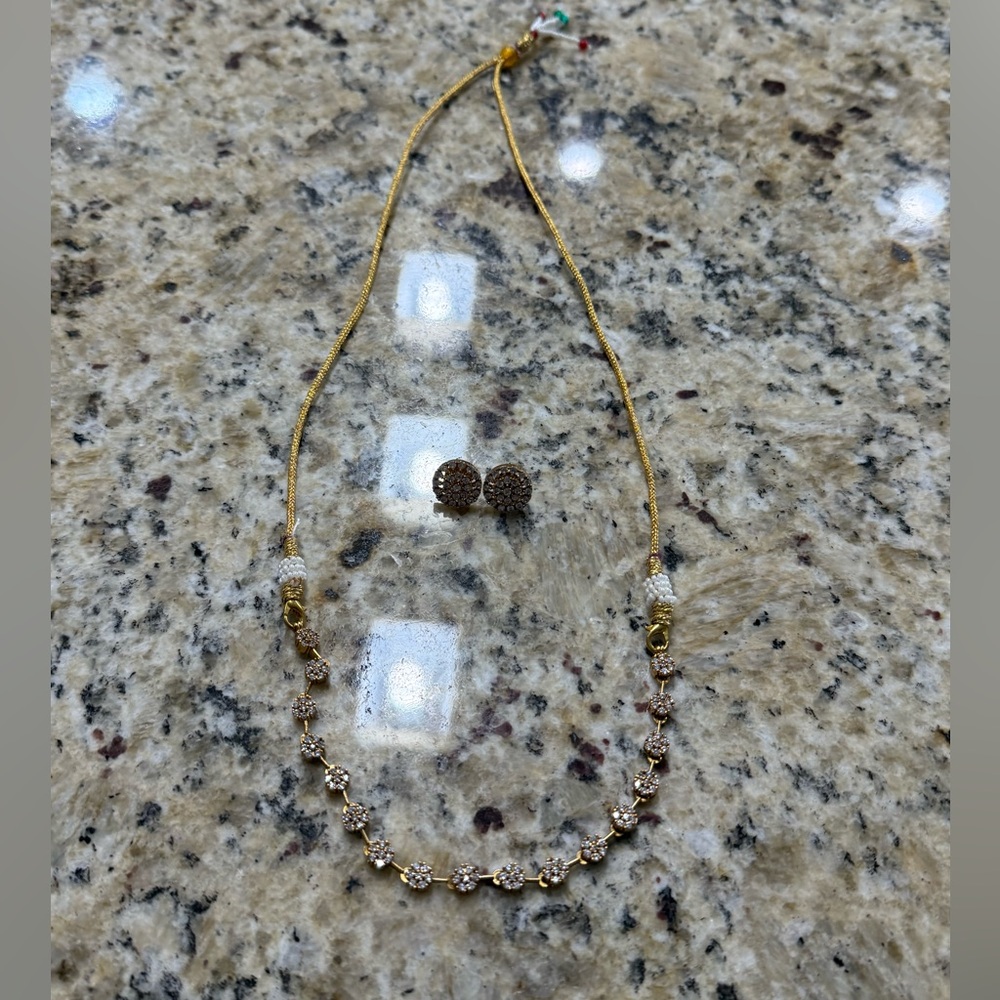 Elegant Gold and Silver Necklace Set